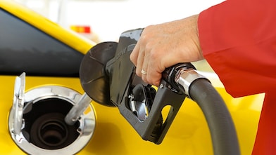 Person filling up at a fuel station