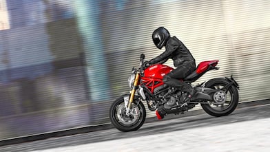 Man riding a bike which is using the Superior Engine Oil For Bikes