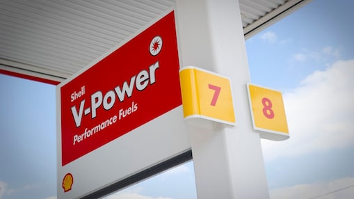 Car travelling along a road at night